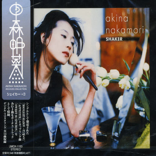 the album cover for Akina Nakamori - Shaker