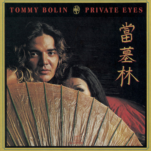 the album cover for Tommy Bolin - Private Eyes