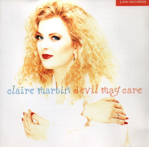 the album cover for Claire Martin - Devil May Care