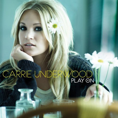 the album cover for Carrie Underwood - Play on