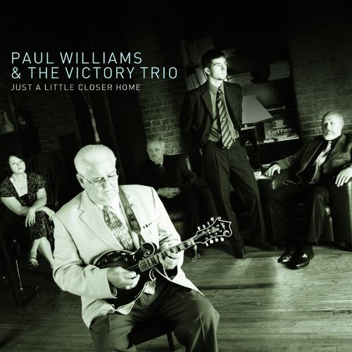 the album cover for Paul Williams - Just a Little Closer Home
