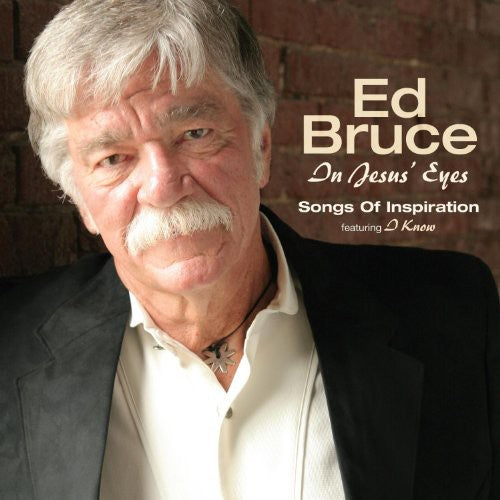 the album cover for Ed Bruce - In Jesus Eyes