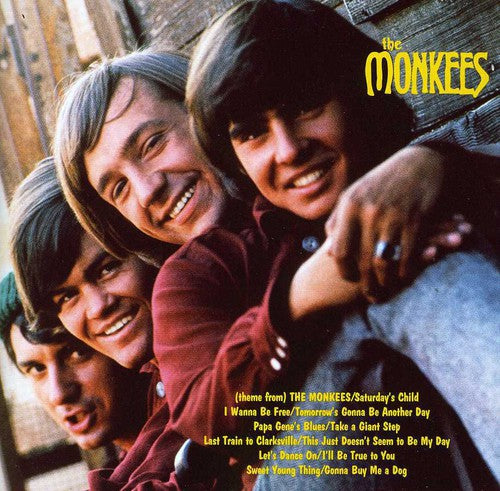 the album cover for The Monkees - The Monkees