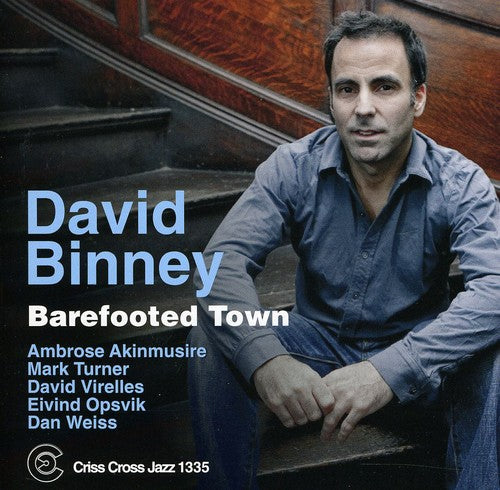 the album cover for Ambrose Akinmusire - Barefooted Town