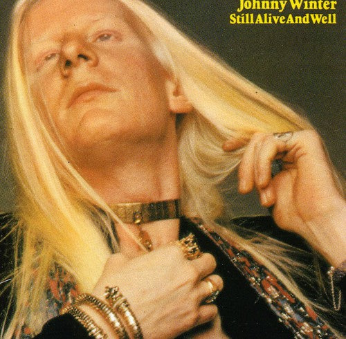 the album cover for Johnny Winter - Still Alive and Well