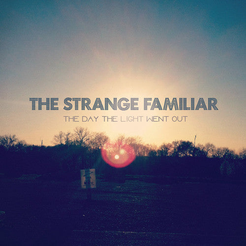 the album cover for The Strange Familiar - Day The Light Went Out