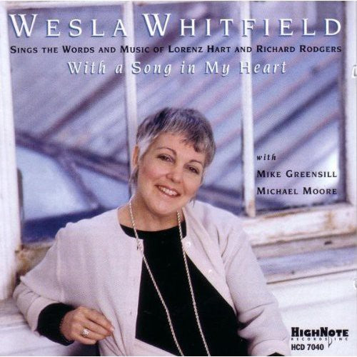 the album cover for Weslia Whitfield - With a Song in My Heart