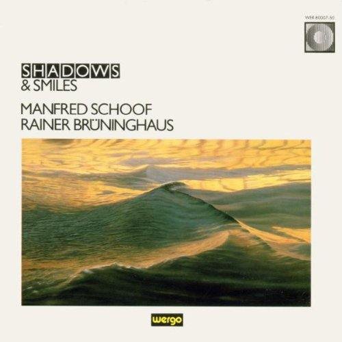 the album cover for Schoof / Bruninghaus - Shadows & Smiles