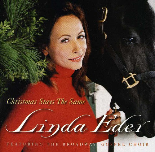 the album cover for Linda Eder - Christmas Stays the Same