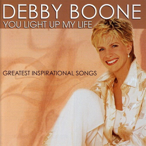 the album cover for Debby Boone - You Light Up My Life: Greatest Inspirational Songs