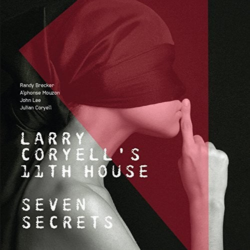 the album cover for Larry Coryell Larry Coryells 11th House - Seven Secrets