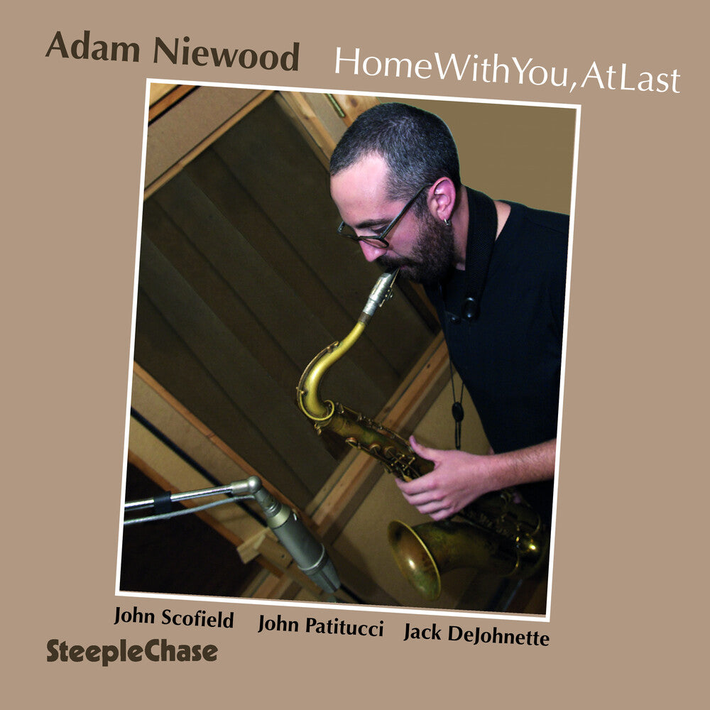 the album cover for Adam Niewood - Home with You at Last