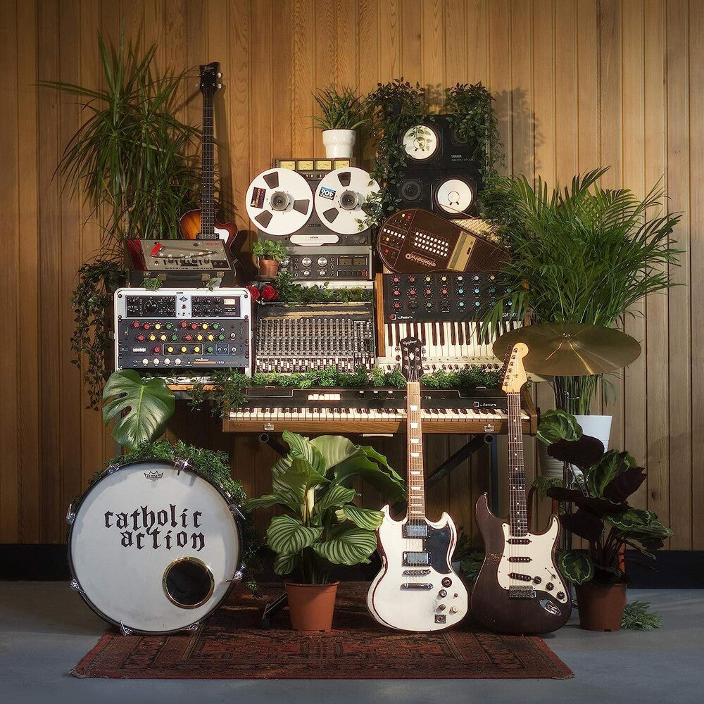 the album cover for Catholic Action - Celebrated By Strangers