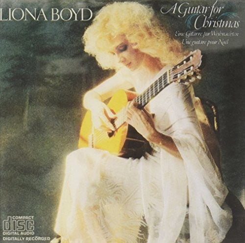 the album cover for Boyd - Guitar for Christmas / Liona