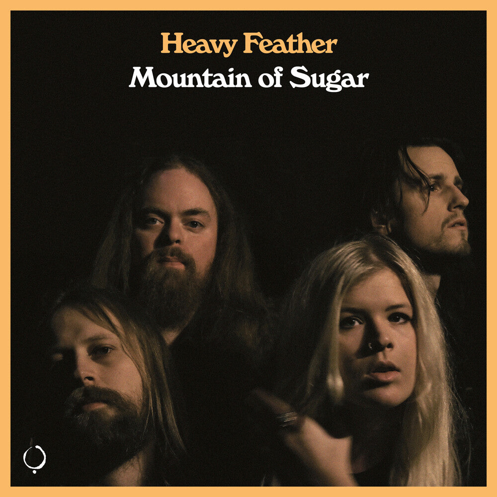 the album cover for Heavy Feather - Mountain Of Sugar
