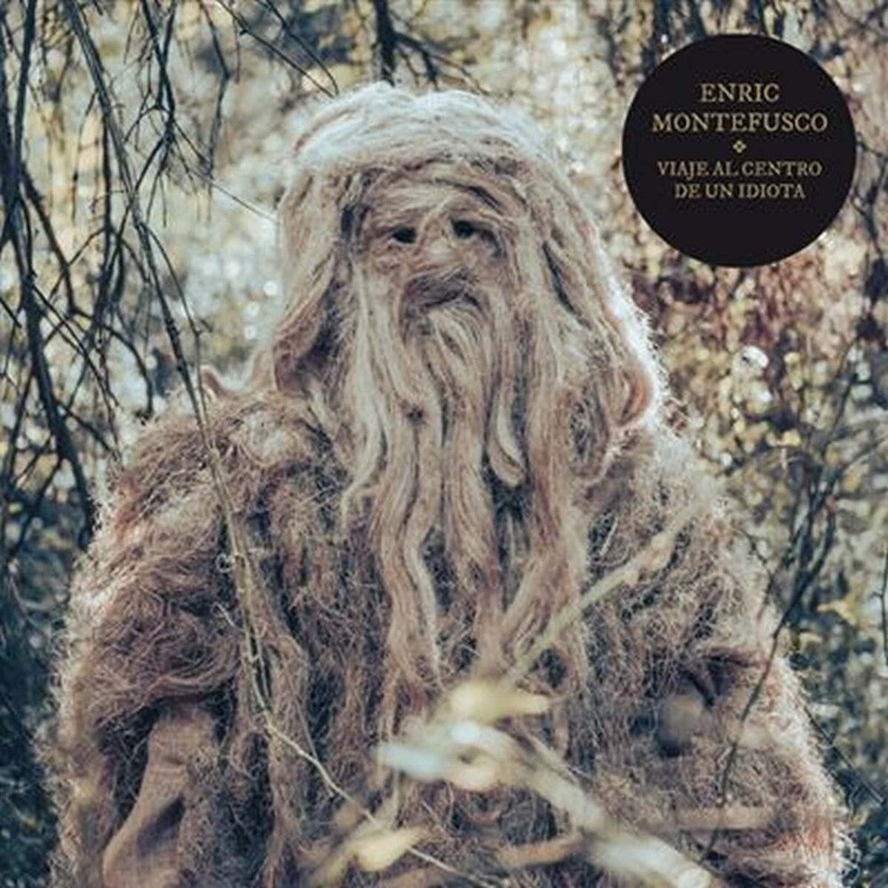 the album cover for Enric Montefusco - Viaje Al Centro De Un Idiota (Spa)