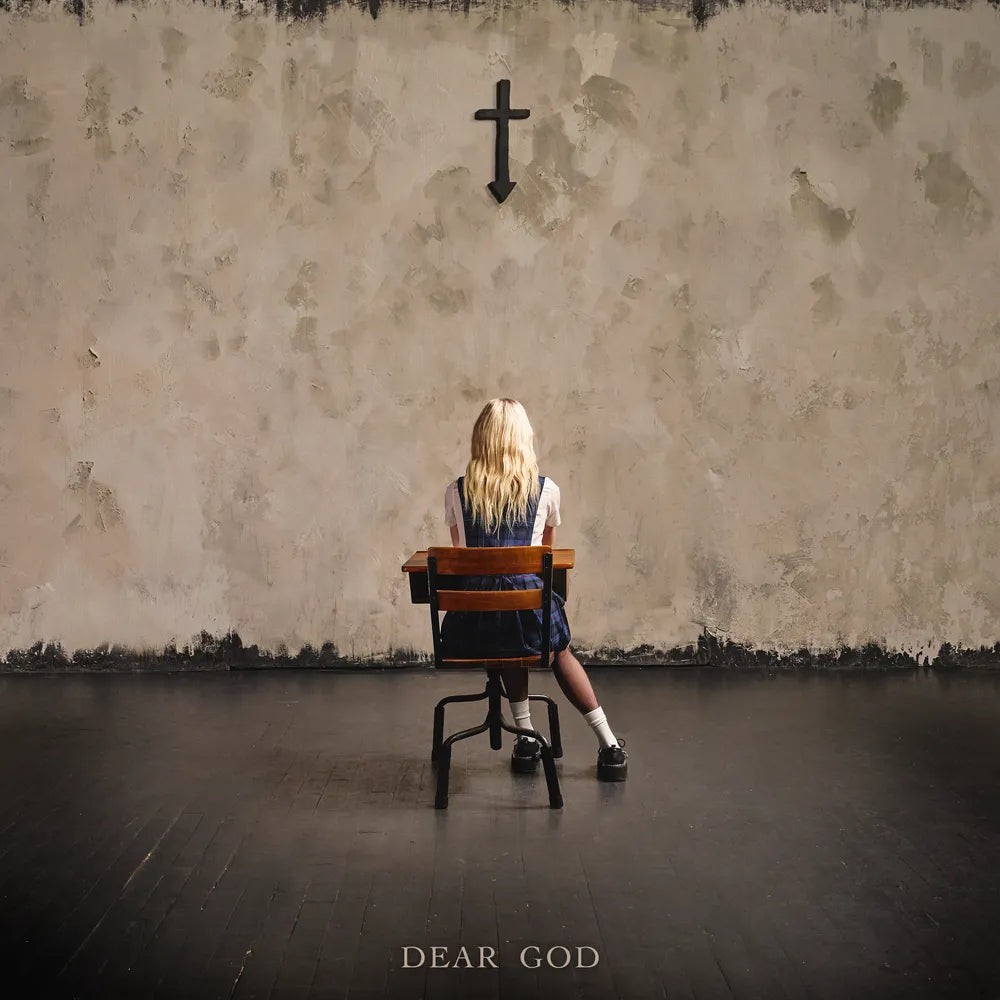 the album cover for The Pretty Reckless - Dear God