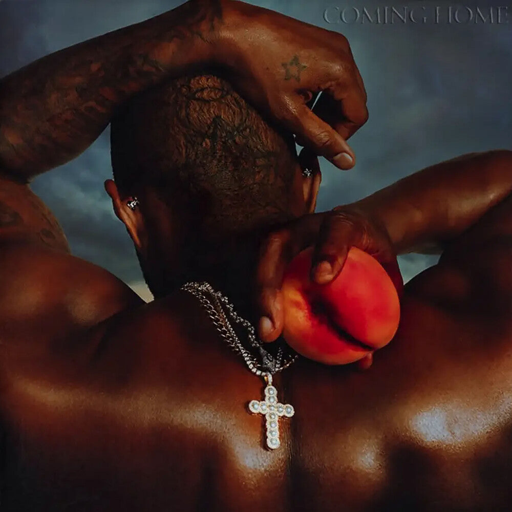 the album cover for USHER - Coming Home
