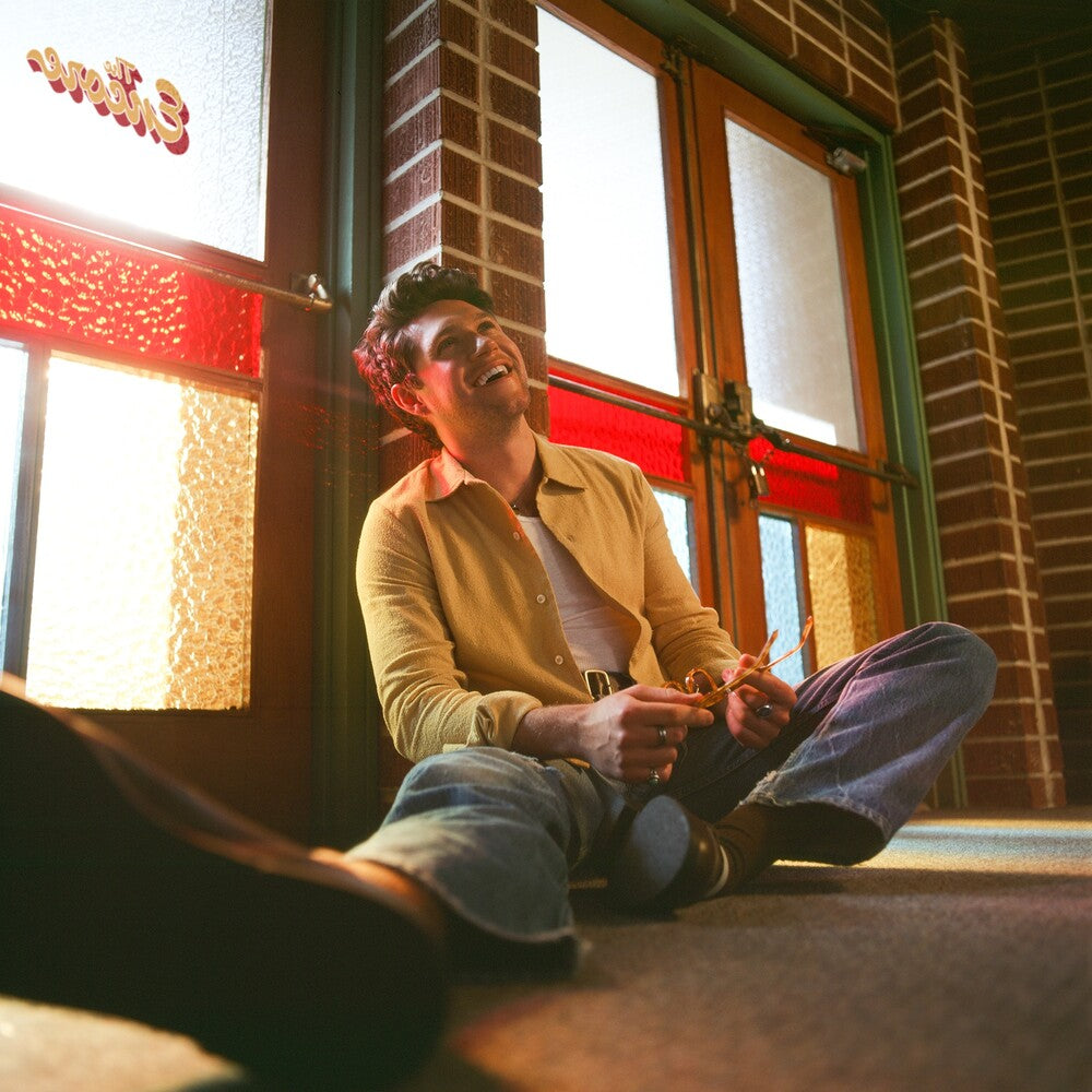 the album cover for Niall Horan - The Show: The Encore