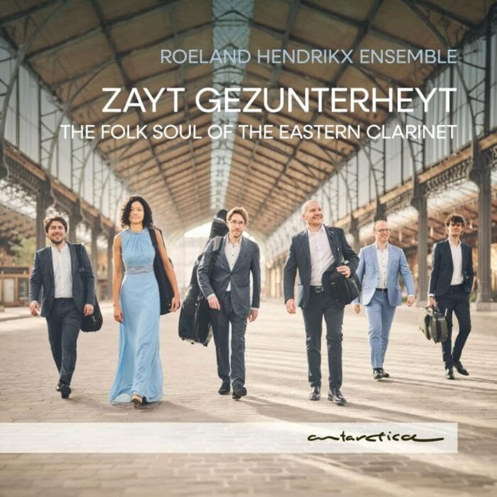 the album cover for Roeland Hendrikx Ensemble - Zayt Gezunterheyt