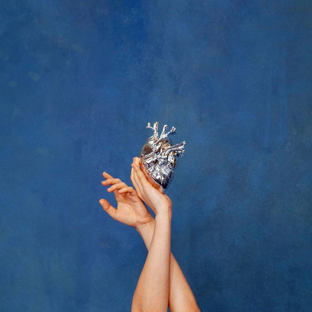 the album cover for Aurora - What Happened To The Heart?