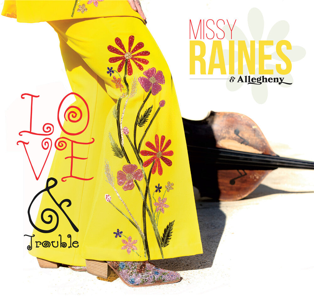 the album cover for Missy Raines - Love & Trouble