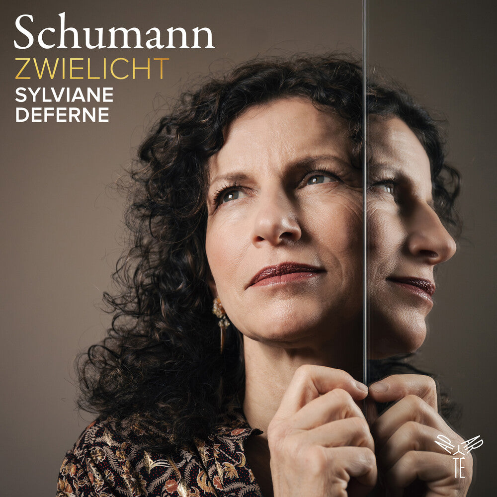the album cover for Sylviane Deferne - Zwielicht - Schumann: Piano Works