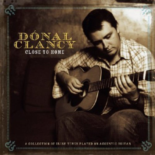 the album cover for Donal Clancy - Close to Home