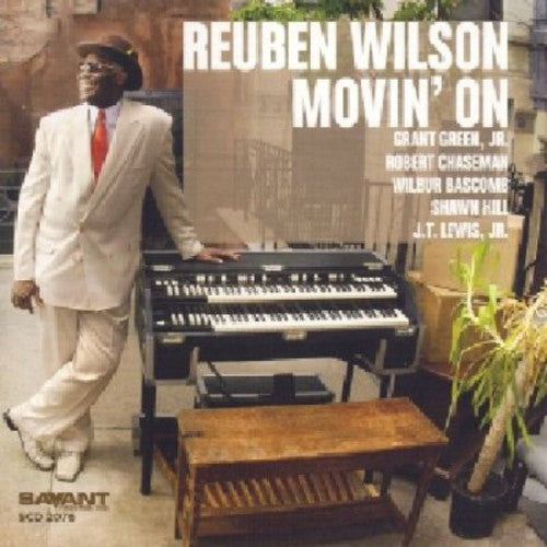 the album cover for Reuben Wilson - Movin on