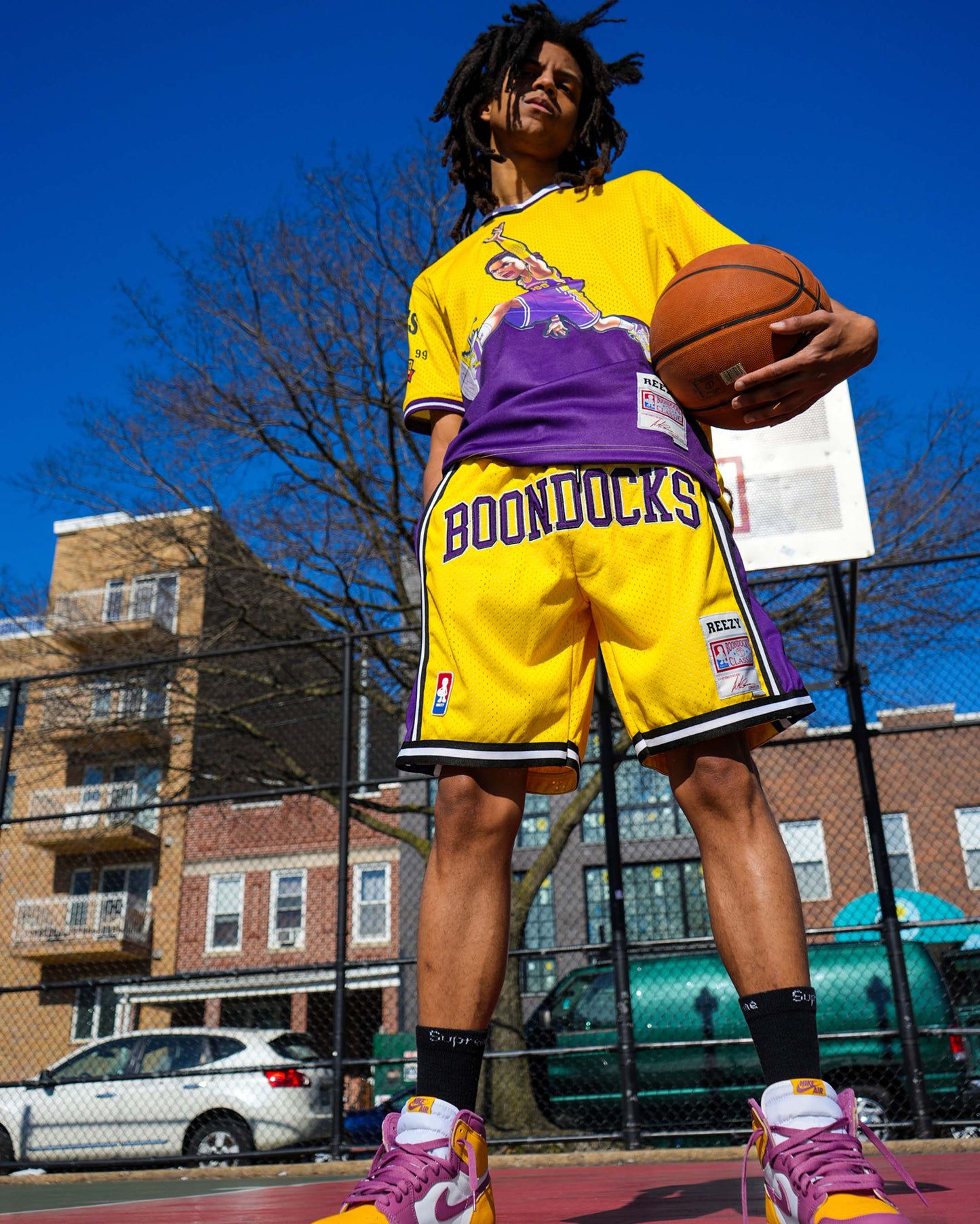 The Boondocks - Air Riley Mesh Knit Yellow & Purple Mens T Shirt