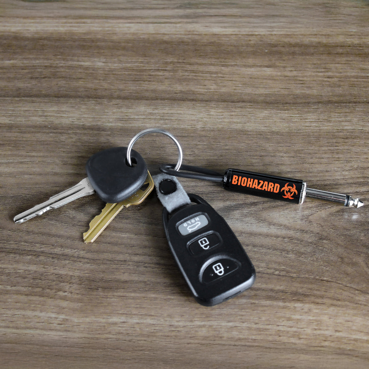 Biohazard Logo Guitar Plug Keychain