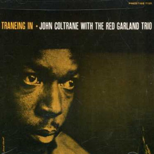 the album cover for John Coltrane - Traneing in: Rudy Van Gelder Remasters Series