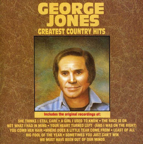the album cover for George Jones - Greatest Country Hits