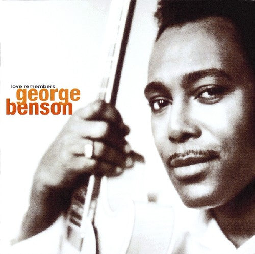 the album cover for George Benson - Love Remembers