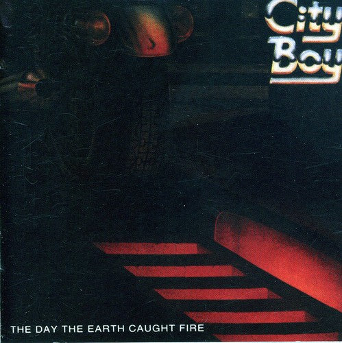 the album cover for City Boy - Day the Earth Caught Fire