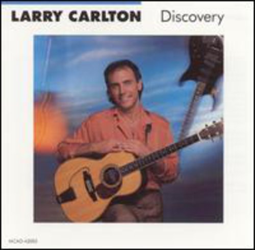 the album cover for Larry Carlton - Discovery