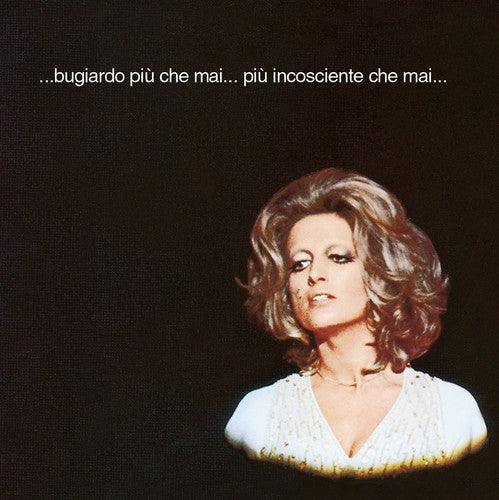 the album cover for Mina - Bugiardo Piu Che Mai Piu [Import]