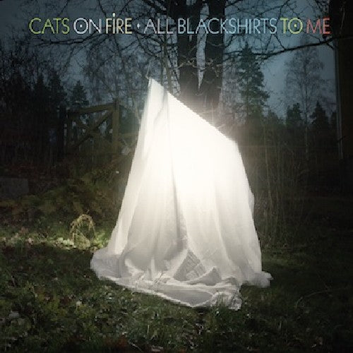 the album cover for Cats On Fire - All Blackshirts to Me