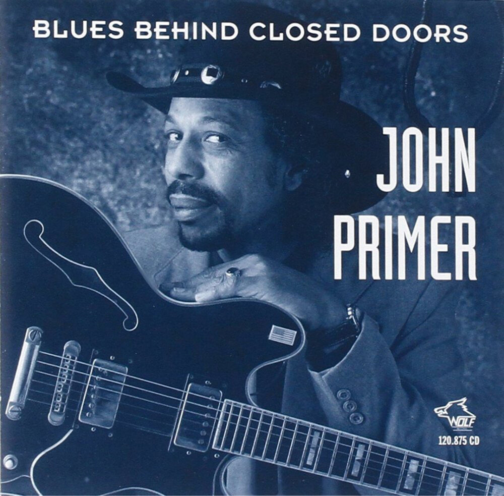 the album cover for John Primer - Blues Behind Closed Doors