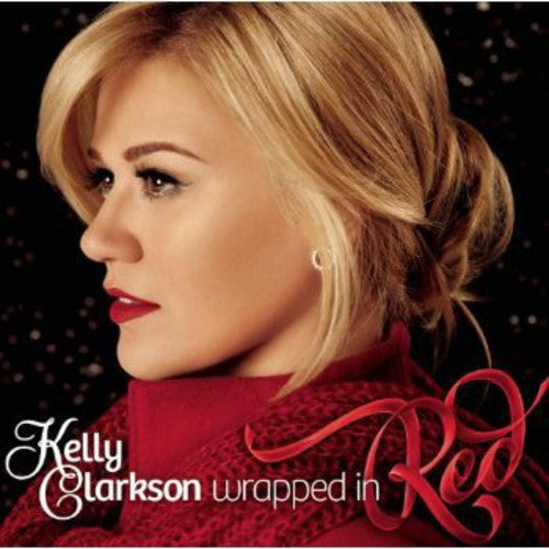 the album cover for Kelly Clarkson - Wrapped In Red: Deluxe Edition [Import]