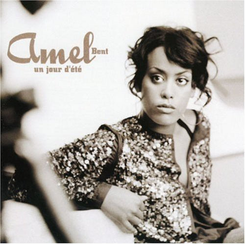 the album cover for Amel Bent - Un Jour D'Ete [New Edition]