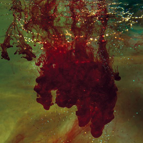 the album cover for The History of Colour TV - When Shapes of Spilt Blood Spelt Love