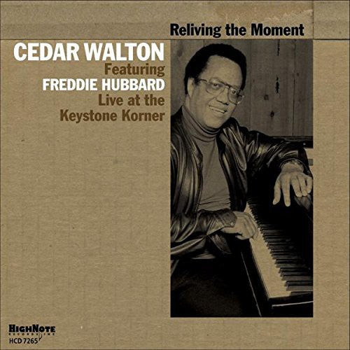 the album cover for Cedar Walton - Reliving the Moment
