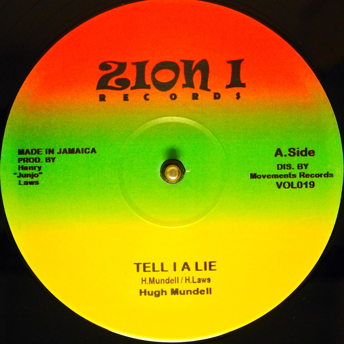 Hugh Mundell - Tell I A Lie; The Roots Radics - Version  /  Hugh Mundell - Jah Music; The Roots Radics - Version 12" Vinyl Record
