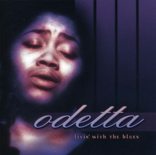 the album cover for Odetta - Livin with the Blues