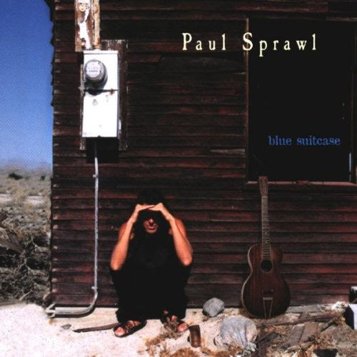 the album cover for Paul Sprawl - Blue Suitcase