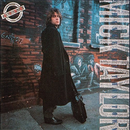 the album cover for Mick Taylor - Stranger In This Town