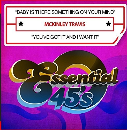 the album cover for Travis Mckinley - Baby Is There Something On Your Mind (Mod) [Remastered]
