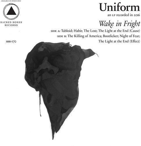 the album cover for Uniform - Wake In Fright