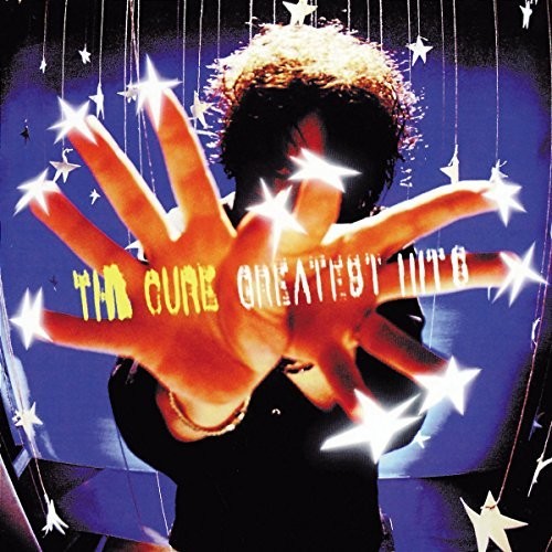 the album cover for The Cure - Greatest Hits: International Edition